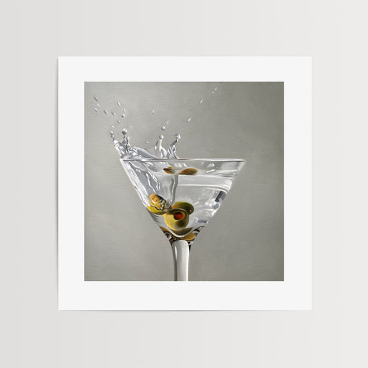 Martini Splash Fine Art Print by Lauren Pretorius: a trio of green olives on a blue cocktail sword with some nice dramatic lighting.