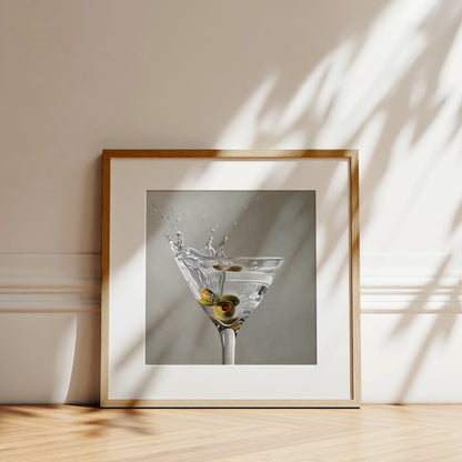 Realistic Martini Splash fine art print in a natural wood frame, featuring olives and liquid splashing.