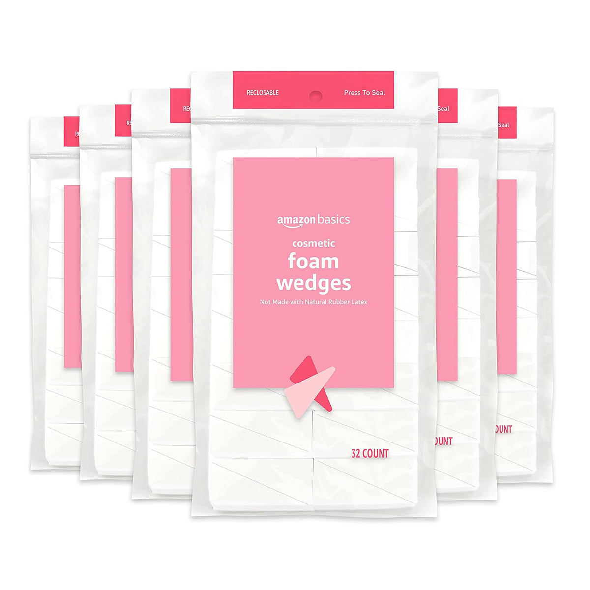 Six packages of Amazon Basics cosmetic foam wedges arranged in a fan, showing the white wedges inside clear plastic bags with bright pink labels and seals.
