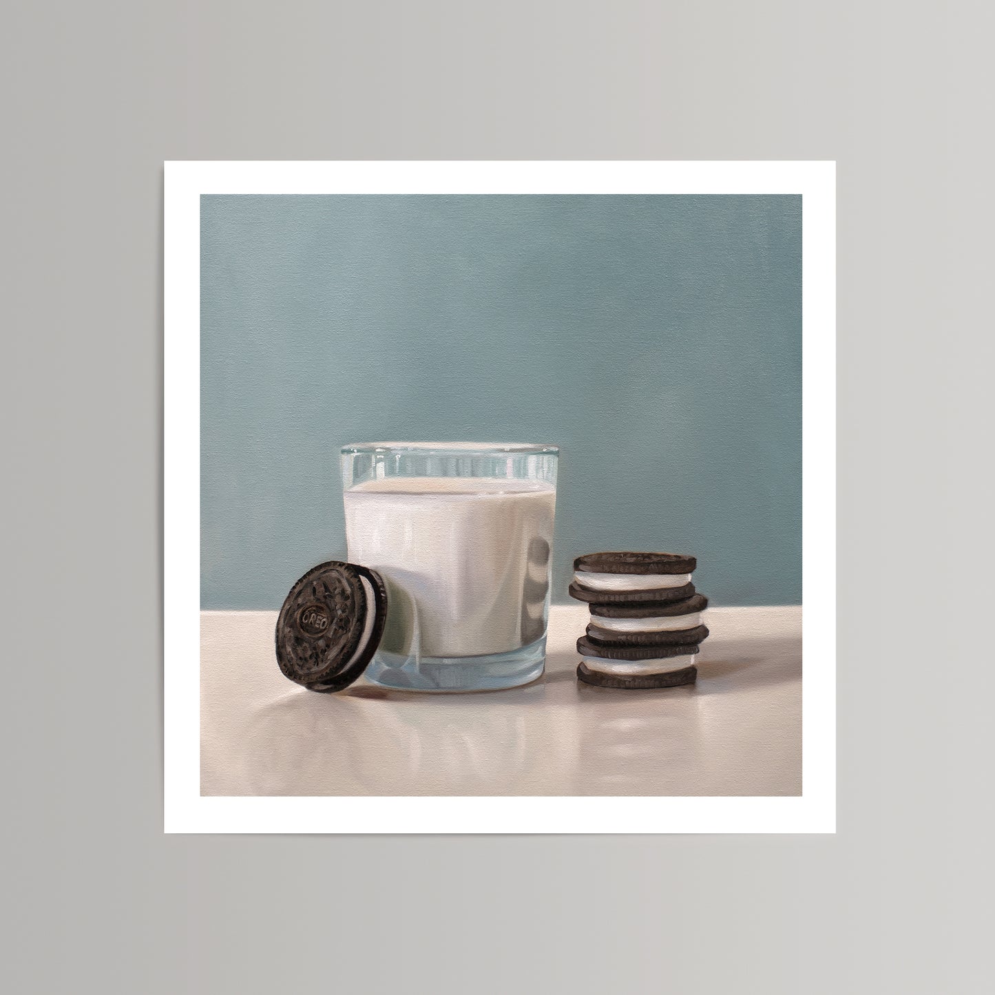 Realistic fine art print of a glass of milk with a stack of Oreo cookies and one leaning against the glass.