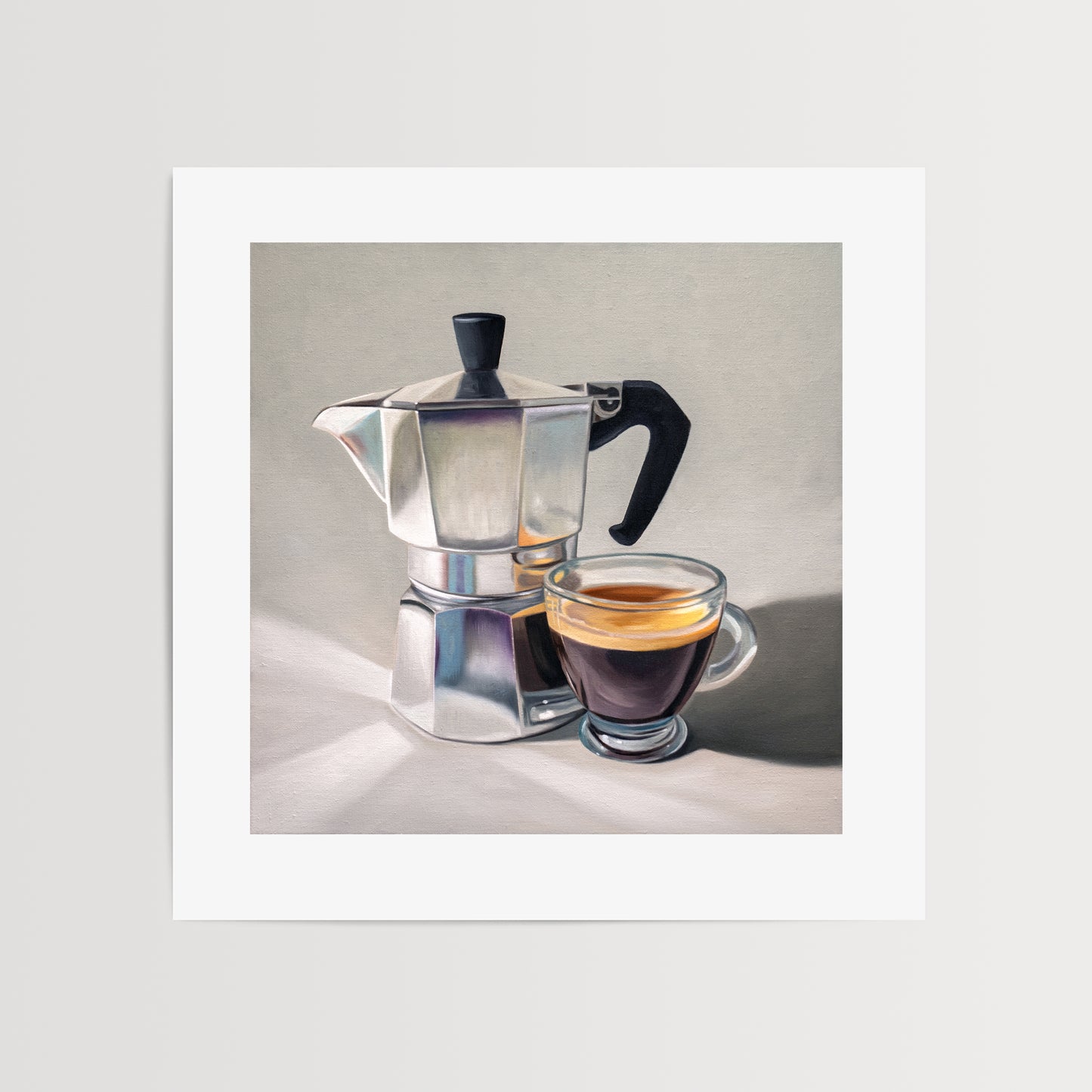 Moka Pot & Espresso Fine Art Print by Lauren Pretorius: a reflective moka pot espresso maker next to a shot of espresso.