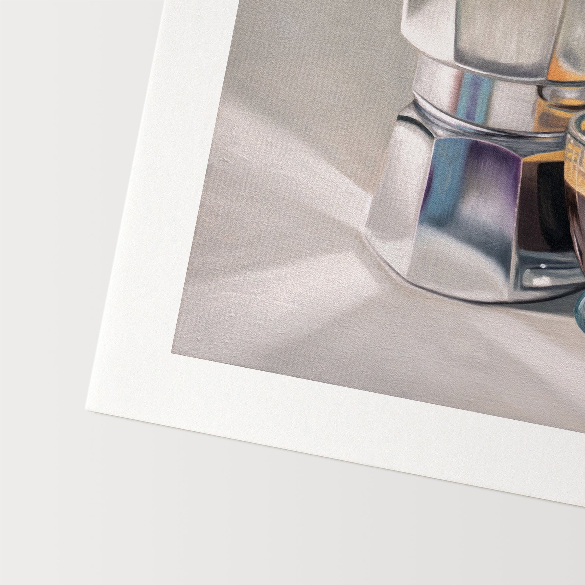 Moka Pot & Espresso Fine Art Print by Lauren Pretorius: a reflective moka pot espresso maker next to a shot of espresso.