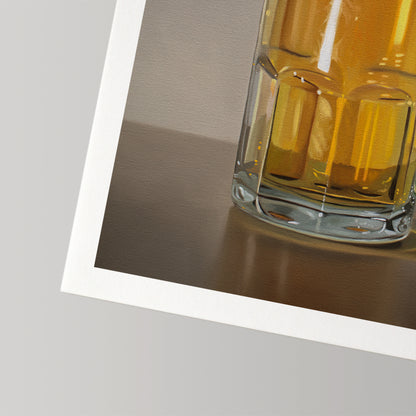 Fine art print of a golden beer in a clear glass mug with a white border.