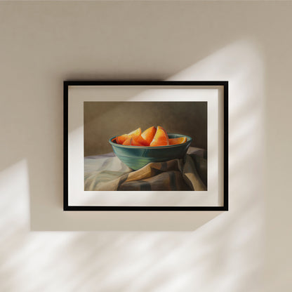 Orange Slices Fine Art Print by Lauren Pretorius: a bowl of orange slices placed on a checkered cloth.