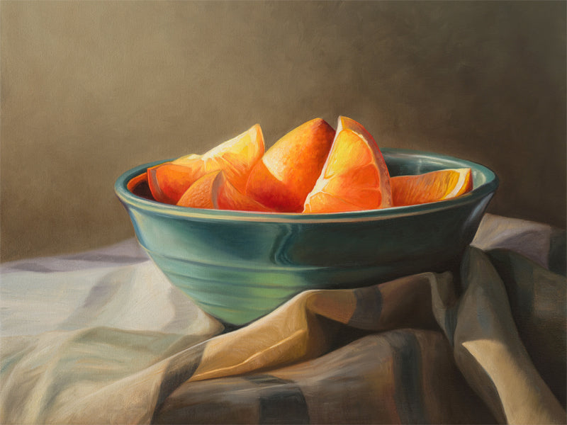Orange Slices Fine Art Print by Lauren Pretorius: a bowl of orange slices placed on a checkered cloth.