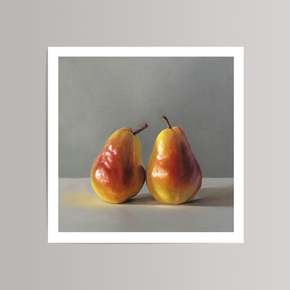 Realistic fine art print of two yellow and red pears on a light surface against a gray background.