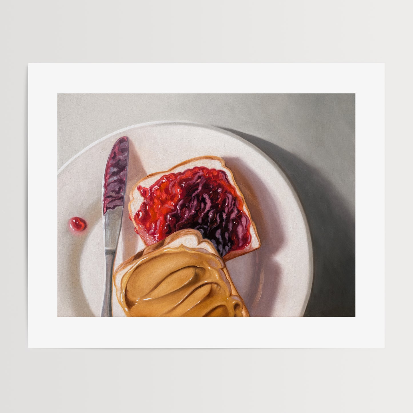 Peanut Butter and Jelly Sandwich Fine Art Print by Lauren Pretorius: a peanut butter and jelly sandwich, depicted with oil paints on a white plate with a knife and a dollop of peanut butter visible.