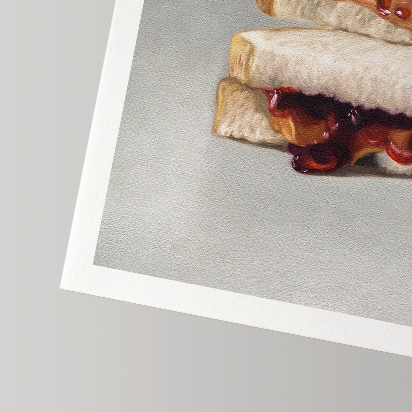 Fine art print of a realistic peanut butter and jelly sandwich on white bread, with a white border.