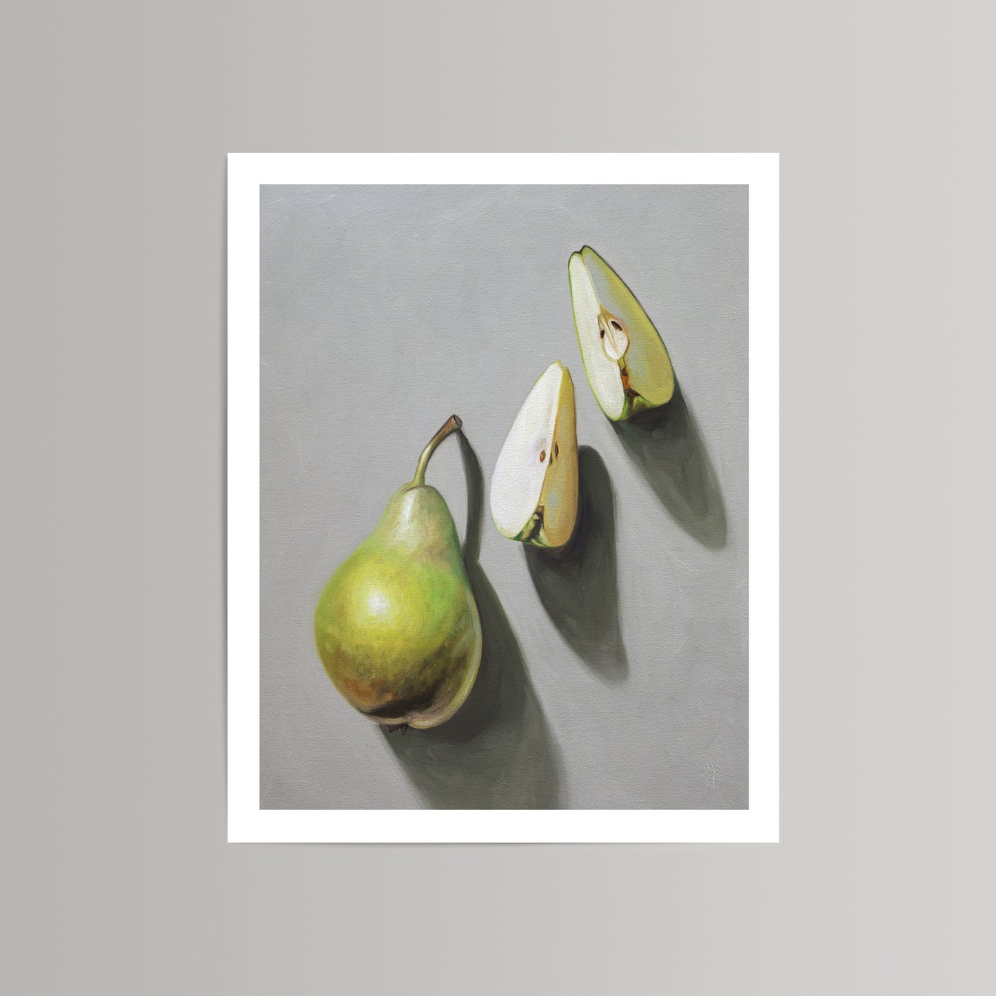 Fine art print of three green pears, one whole and two sliced, on a gray background with shadows.