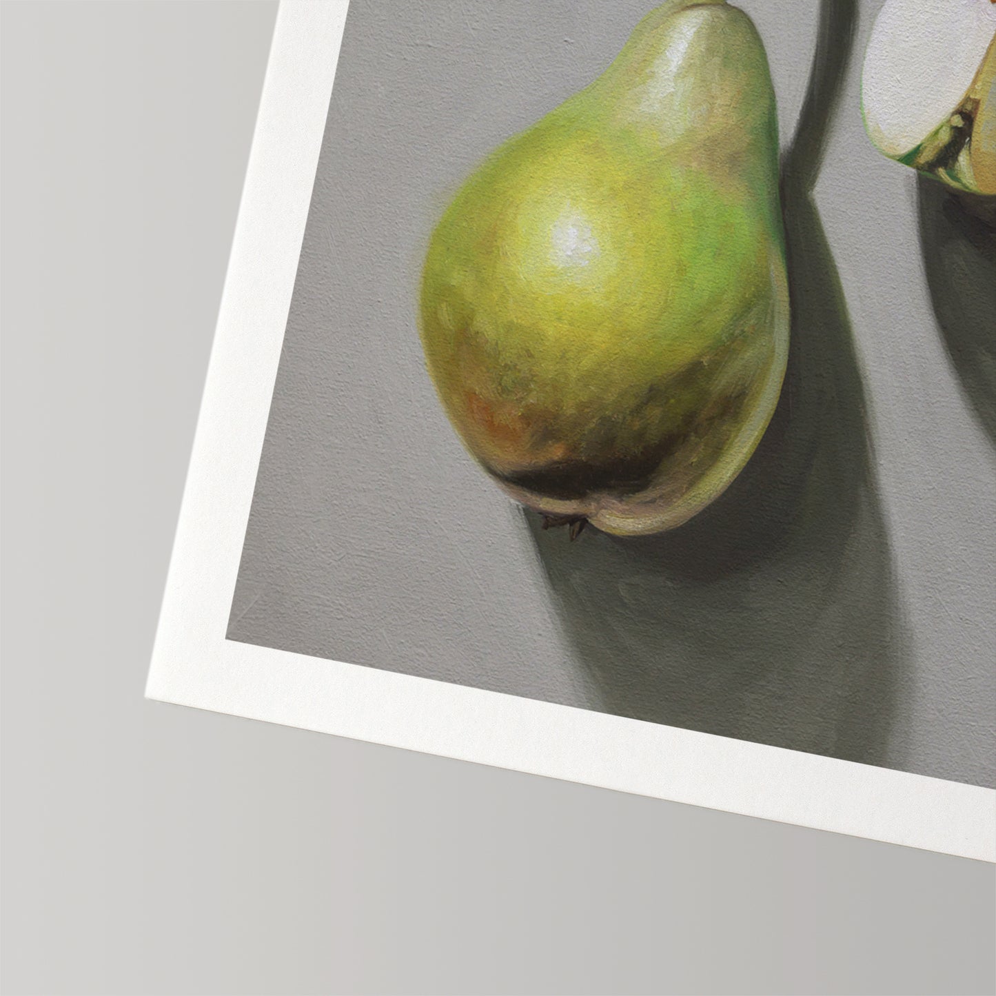Fine art print of a vibrant green pear on a gray background, with a white border.