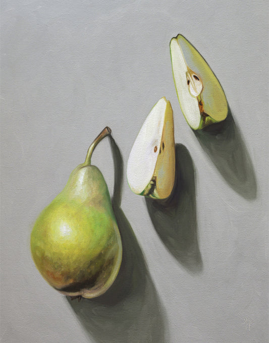 Fine art print of a green pear and two sliced pear halves on a grey background.