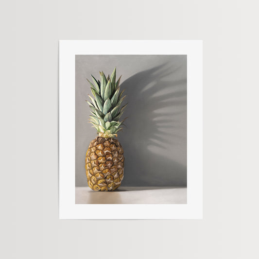 Pineapple & Shadow Fine Art Print by Lauren Pretorius: a pineapple resting directly in front of a neutral grey wall with dramatic side-lighting creating interesting cast shadows.