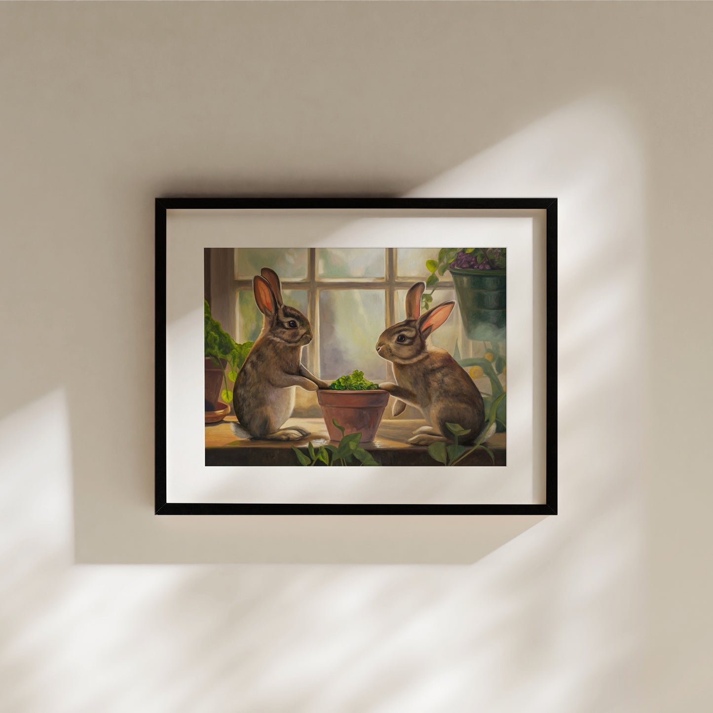 Rabbits & Four Leaf Clovers Fine Art Print by Lauren Pretorius: two rabbits interacting with a potted plant indoors.