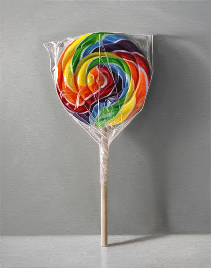 Vibrant rainbow swirl lollipop fine art print, wrapped in clear plastic with a wooden stick, on a gray background.