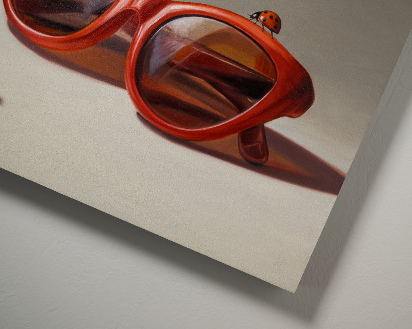Red Ladies Trio 14" x 11" Original Oil Painting by Lauren Pretorius: red sunglasses with a reflective surface, two ladybugs on and around them against a neutral background.