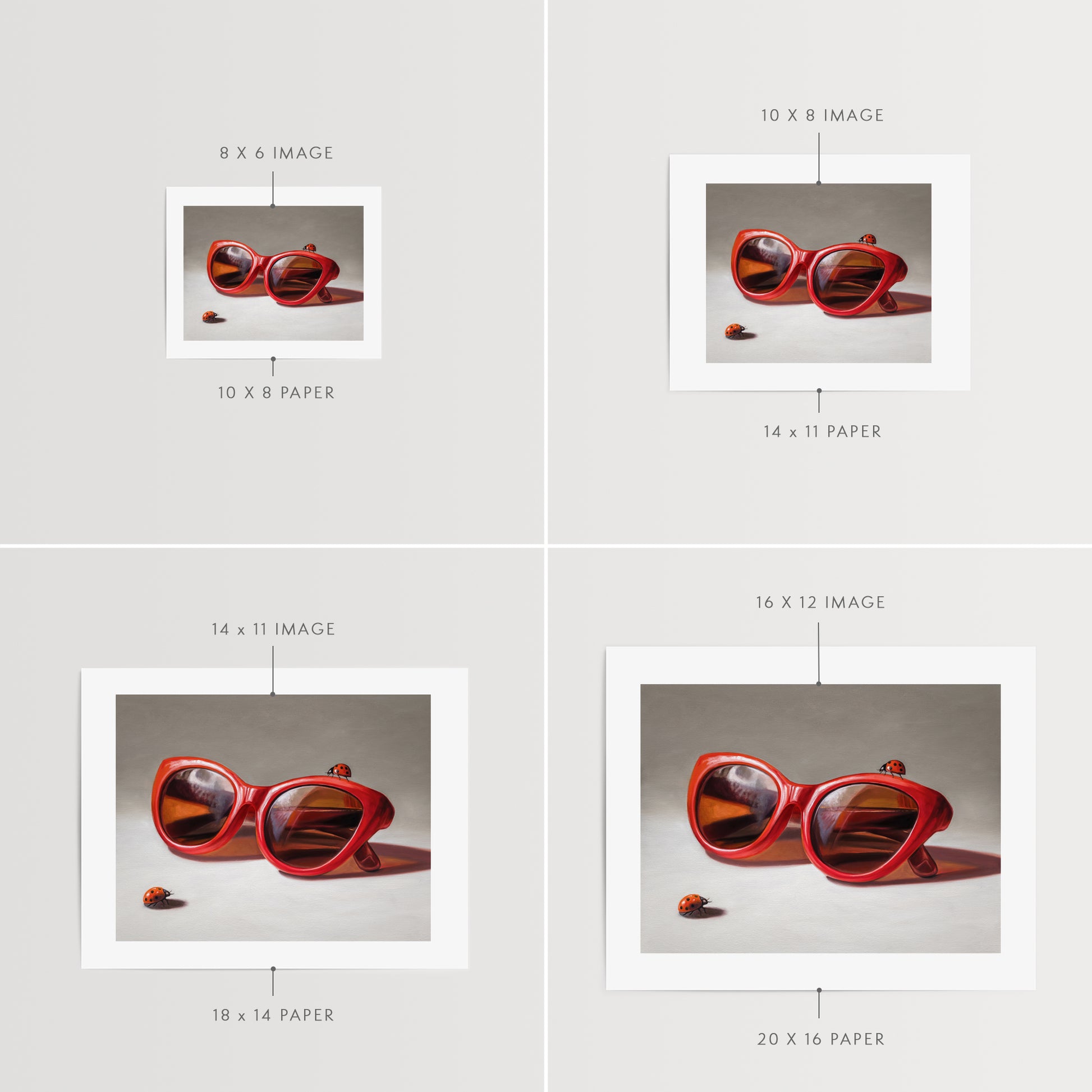 Red Ladies Trio Fine Art Print by Lauren Pretorius: red sunglasses with a reflective surface, two ladybugs on and around them against a neutral background.