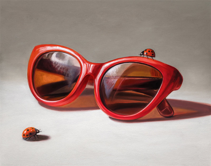 Red Ladies Trio Fine Art Print by Lauren Pretorius: red sunglasses with a reflective surface, two ladybugs on and around them against a neutral background.
