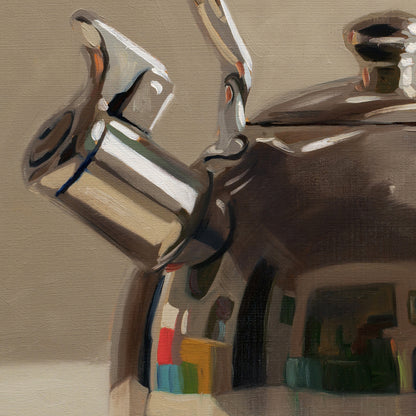 Close-up of a metallic object with a textured background