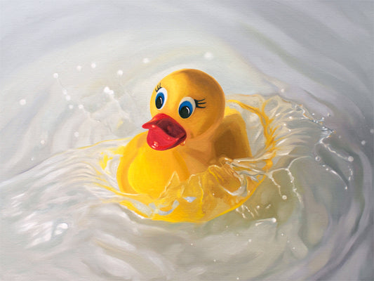 Rubber Ducky Splash Fine Art Print by Lauren Pretorius: a rubber ducky being dropped into a pool of water surrounded by ripples and splashes.