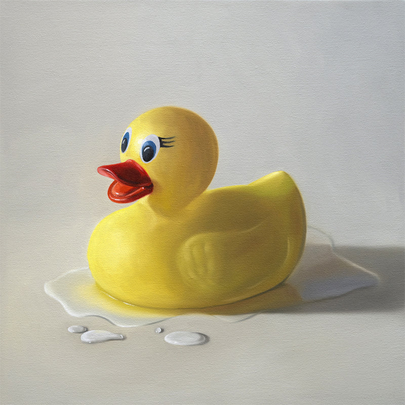 Rubber Ducky Splash Fine Art Print by Lauren Pretorius: a rubber ducky resting on a light surface surrounded by water droplets with some nice dramatic lighting.