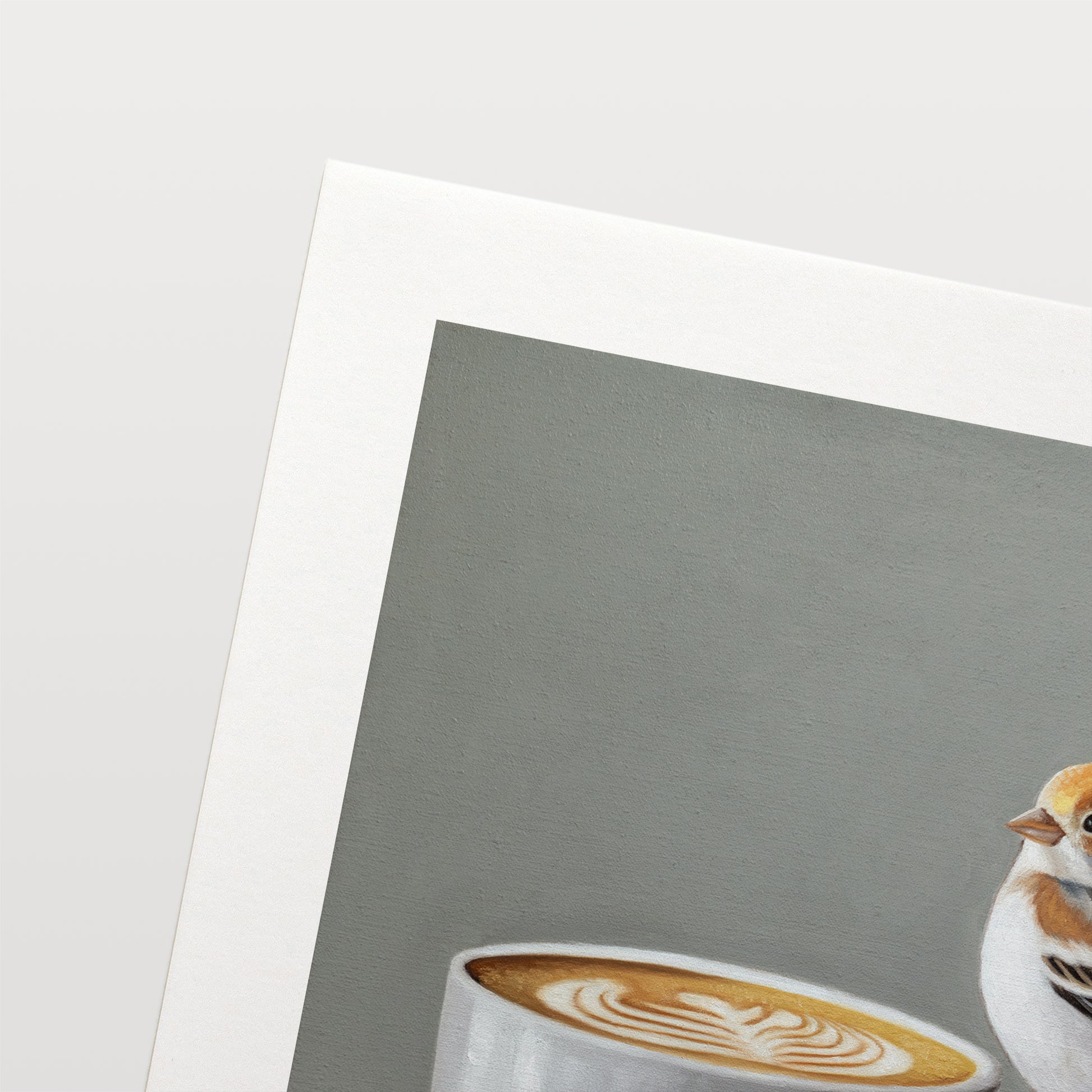 Snow Bunting & Latte Fine Art Print by Lauren Pretorius: a snow bunting perched on the handle of a white cup of coffee.