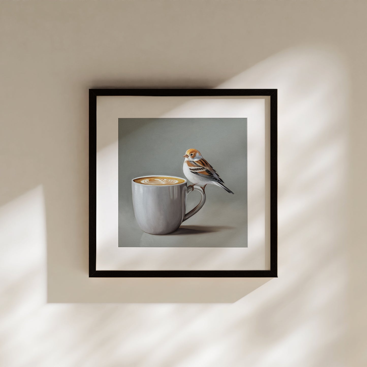 Snow Bunting & Latte Fine Art Print by Lauren Pretorius: a snow bunting perched on the handle of a white cup of coffee.