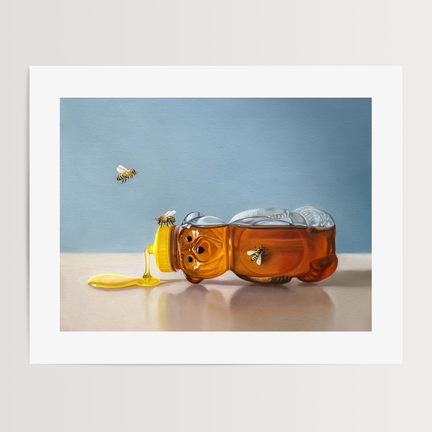 Spilled Honey & Bees Fine Art Print by Lauren Pretorius: a tipped over honey bear surrounded by a trio of honey bees.