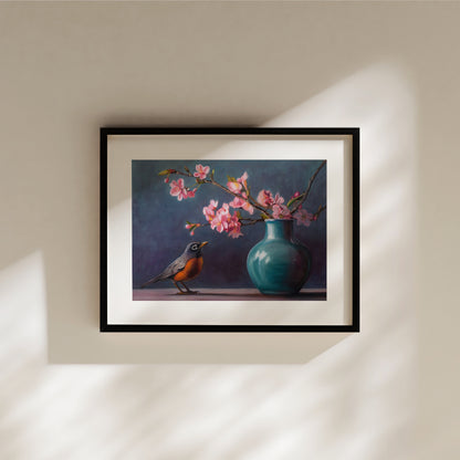 Spring Robin Fine Art Print by Lauren Pretorius: a robin perched next to a vase with pink cherry blossoms against a dark background.