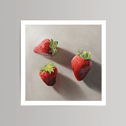 Realistic fine art print of three vibrant red strawberries with green caps on a light gray background.