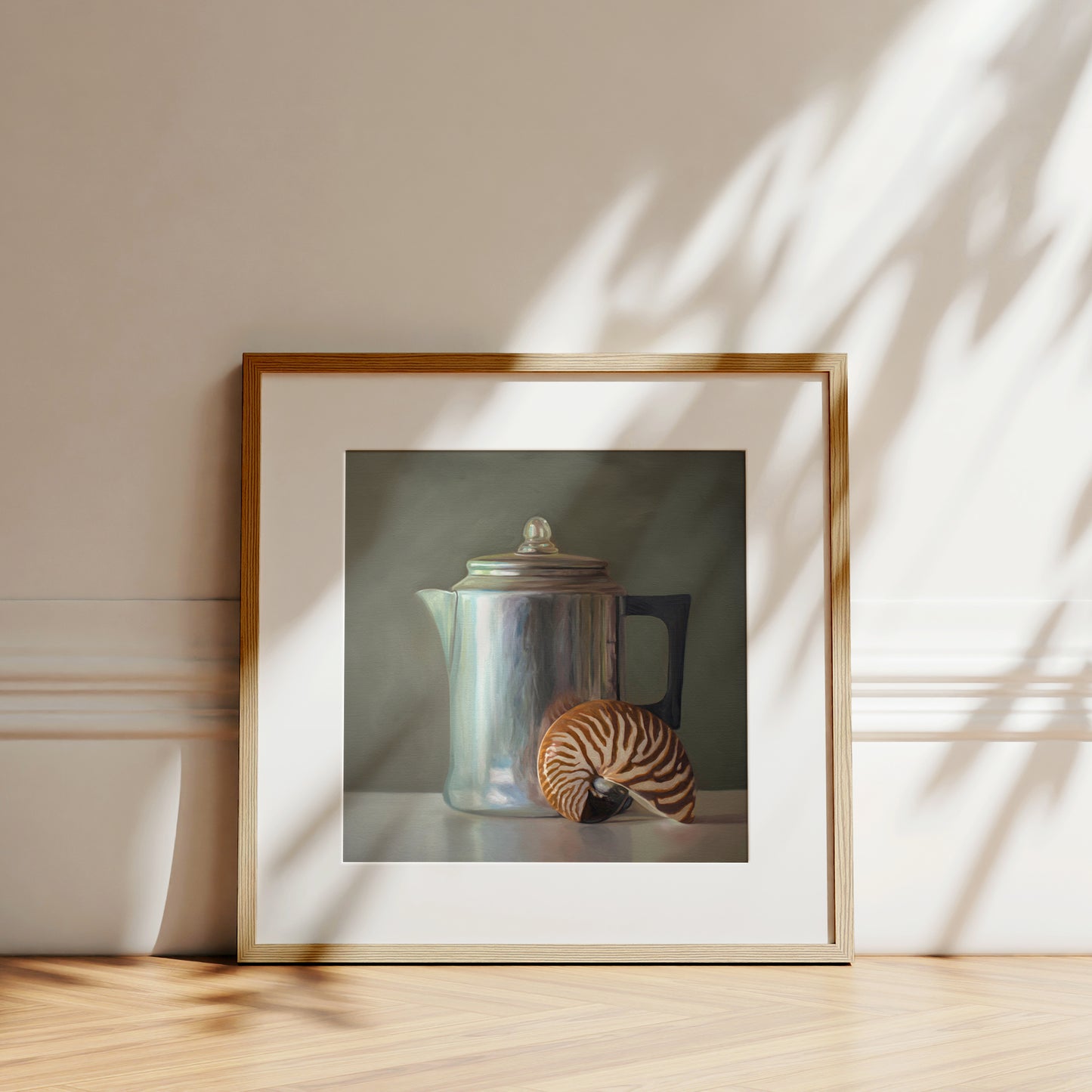 Tea Kettle and Nautilus Shell Fine Art Print by Lauren Pretorius: a nautilus shell resting next to a vintage tea kettle.is from a series tea kettles paired with various objects.