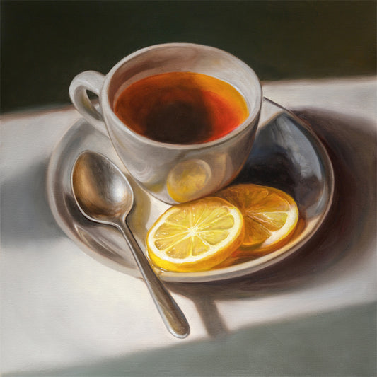 Tea with Lemons Fine Art Print by Lauren Pretorius: a cup of tea with lemon slices on a plate, accompanied by a spoon, against a light background.