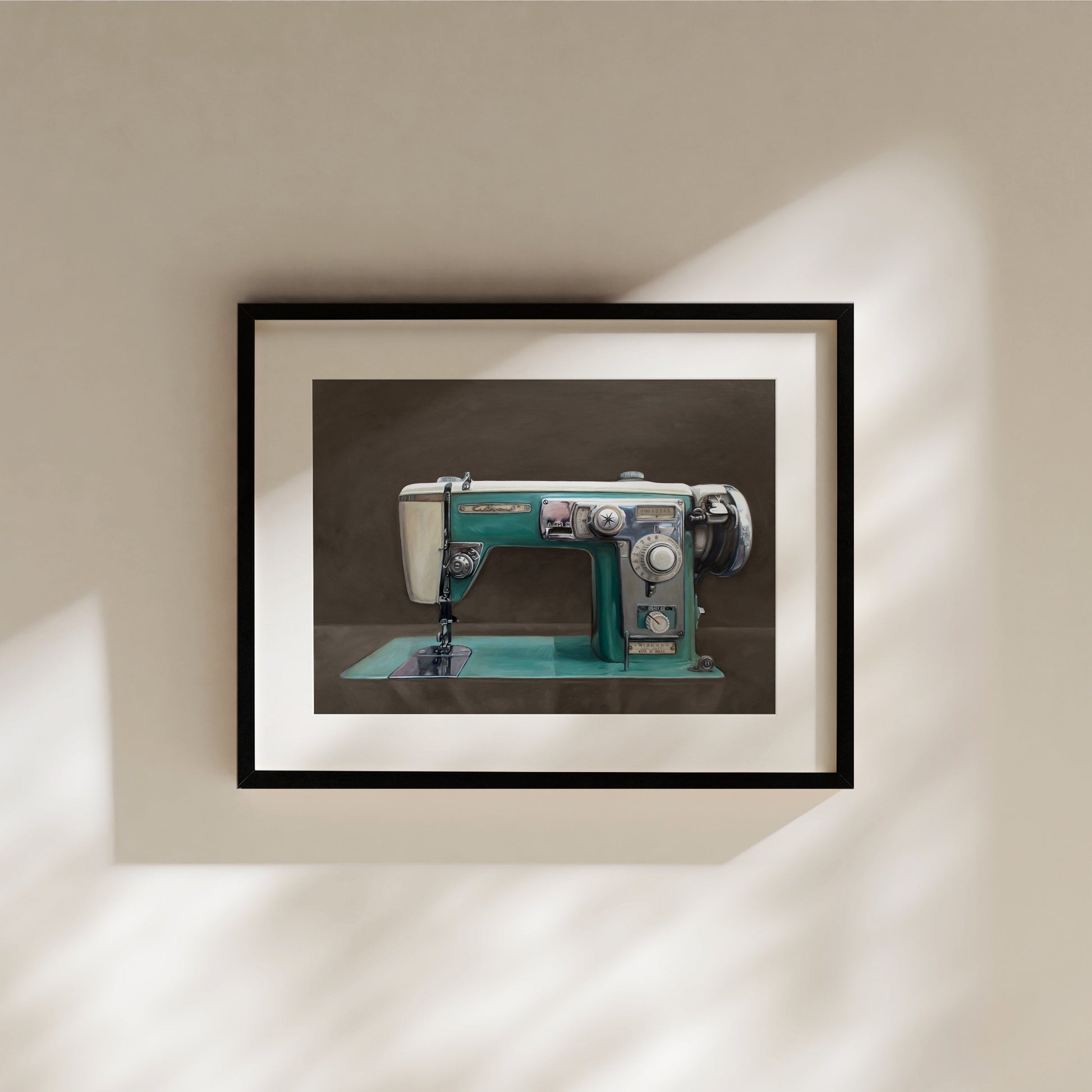 The Wizard Sewing Machine Fine Art Print by Lauren Pretorius: a Wizard vintage turquoise sewing machine with a dark grey background with brown undertones.