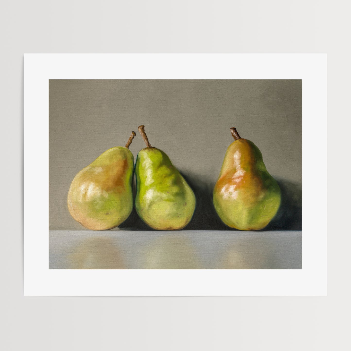Three Pears Fine Art Print by Lauren Pretorius: three green pears with brown stems on a reflective surface and gray background