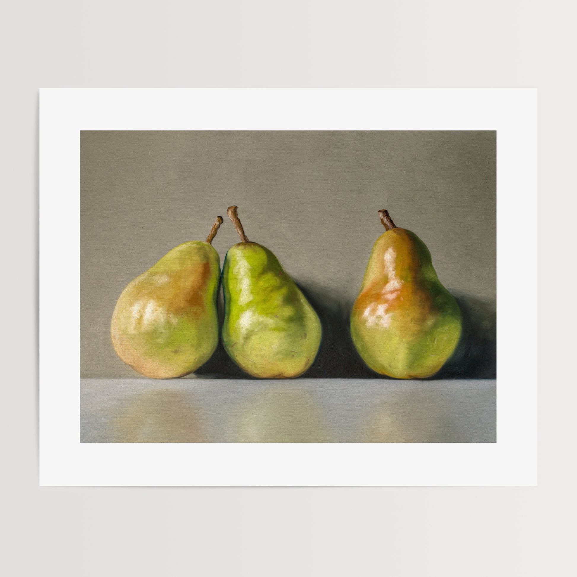 Three Pears Fine Art Print by Lauren Pretorius: three green pears with brown stems on a reflective surface and gray background