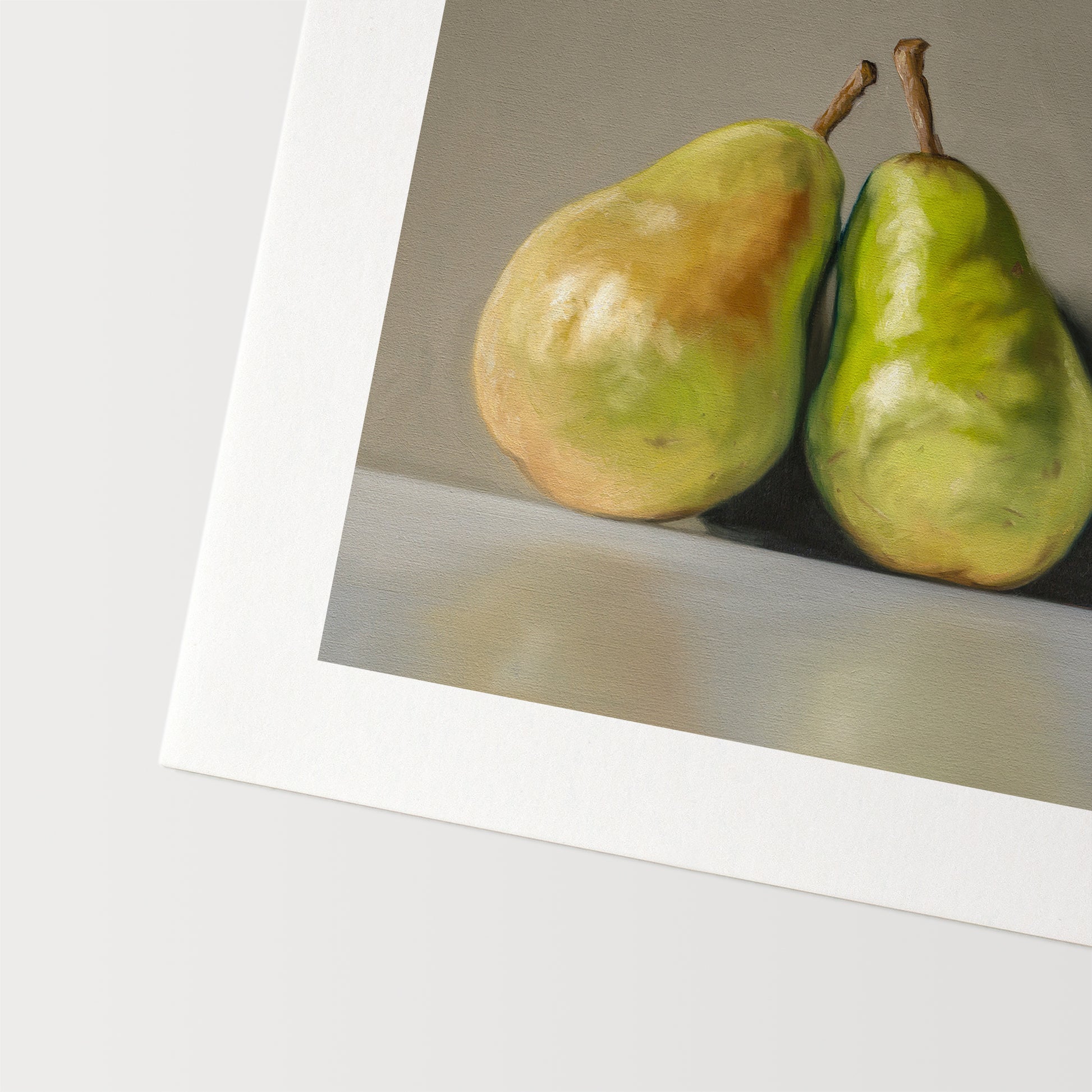 Three Pears Fine Art Print by Lauren Pretorius: three green pears with brown stems on a reflective surface and gray background