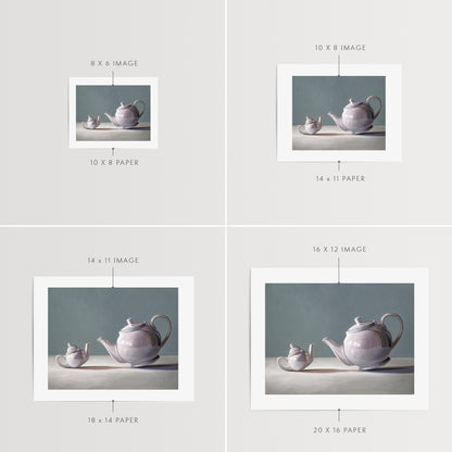 Tiny Teapot Fine Art Print by Lauren Pretorius: teapot curiously inspecting its little bitty counterpart.