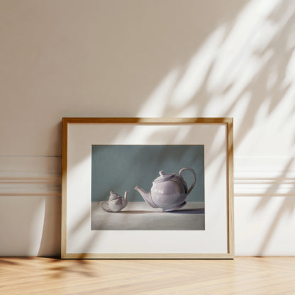 Tiny Teapot Fine Art Print by Lauren Pretorius: teapot curiously inspecting its little bitty counterpart.