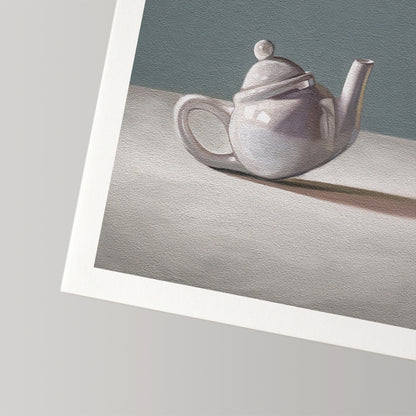 Fine art print of a white ceramic teapot with lid, casting a shadow on a light surface against a gray background.