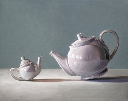 Fine art print of two white teapots, one large and one small, on a white surface against a blue-gray background.