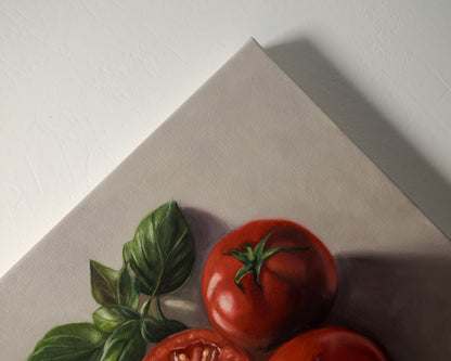 Tomato & Basil 12" x 12" Original Oil Painting by Lauren Pretorius: a knife next to three tomatoes and basil leaves on a light surface
