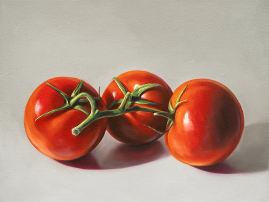 Tomato Trio Fine Art Print by Lauren Pretorius: a trio of tomatoes still on the vine, resting on a light surface with some nice dramatic lighting.