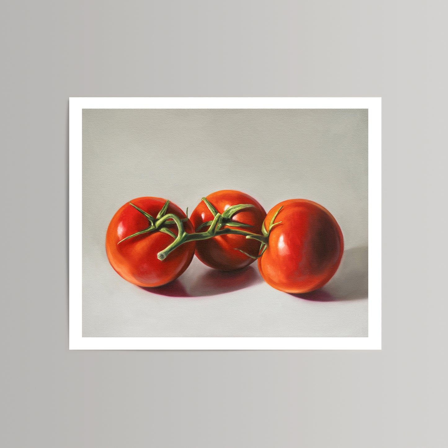 Vibrant "Tomato Trio" fine art print featuring three red tomatoes with green stems on a light background.