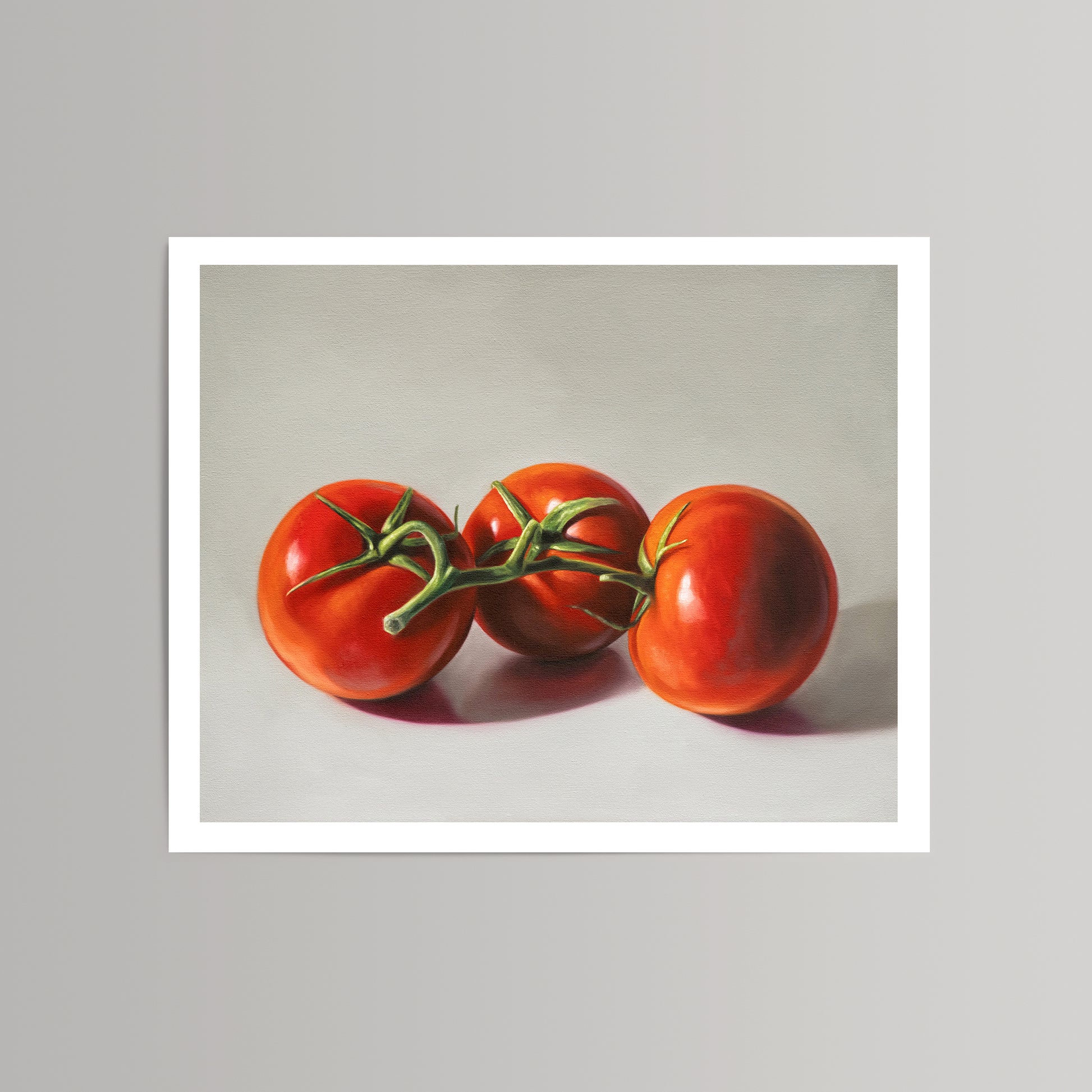 Vibrant "Tomato Trio" fine art print featuring three red tomatoes with green stems on a light background.