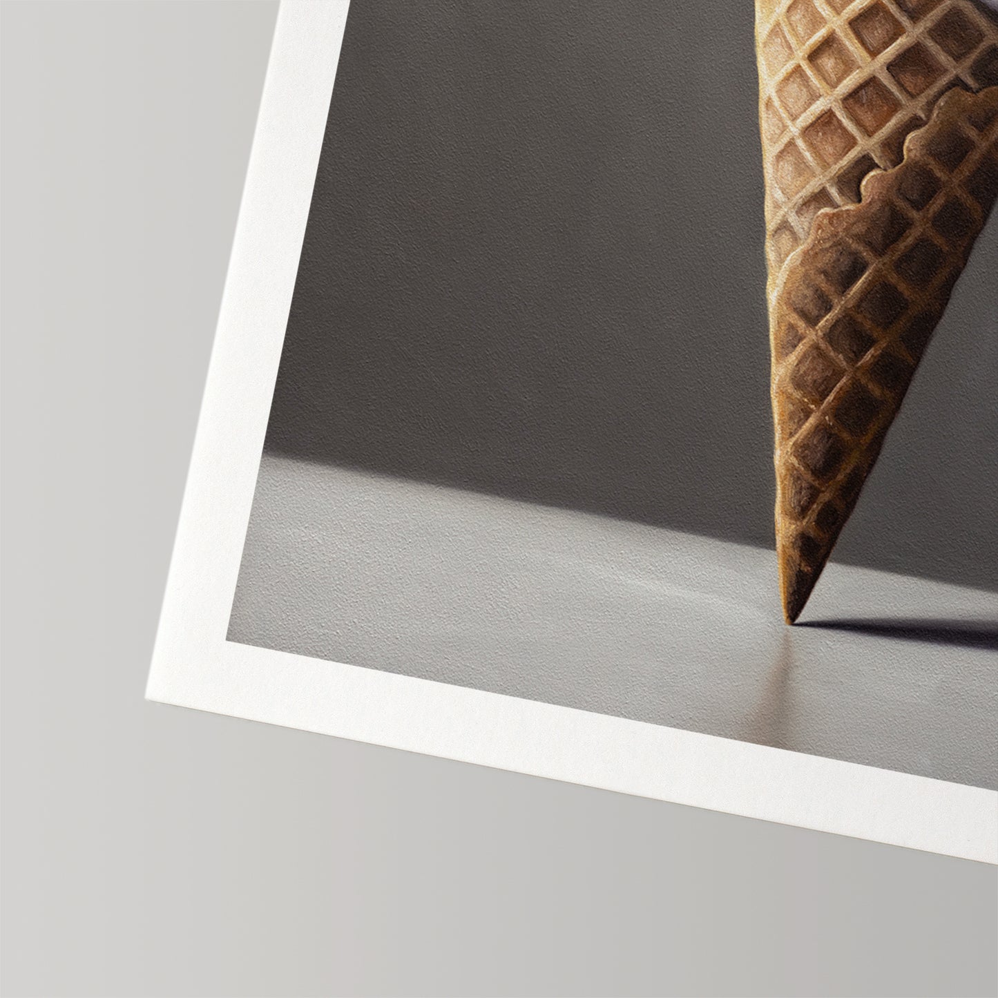 Fine art print of a realistic waffle ice cream cone on a gray background with a white border.