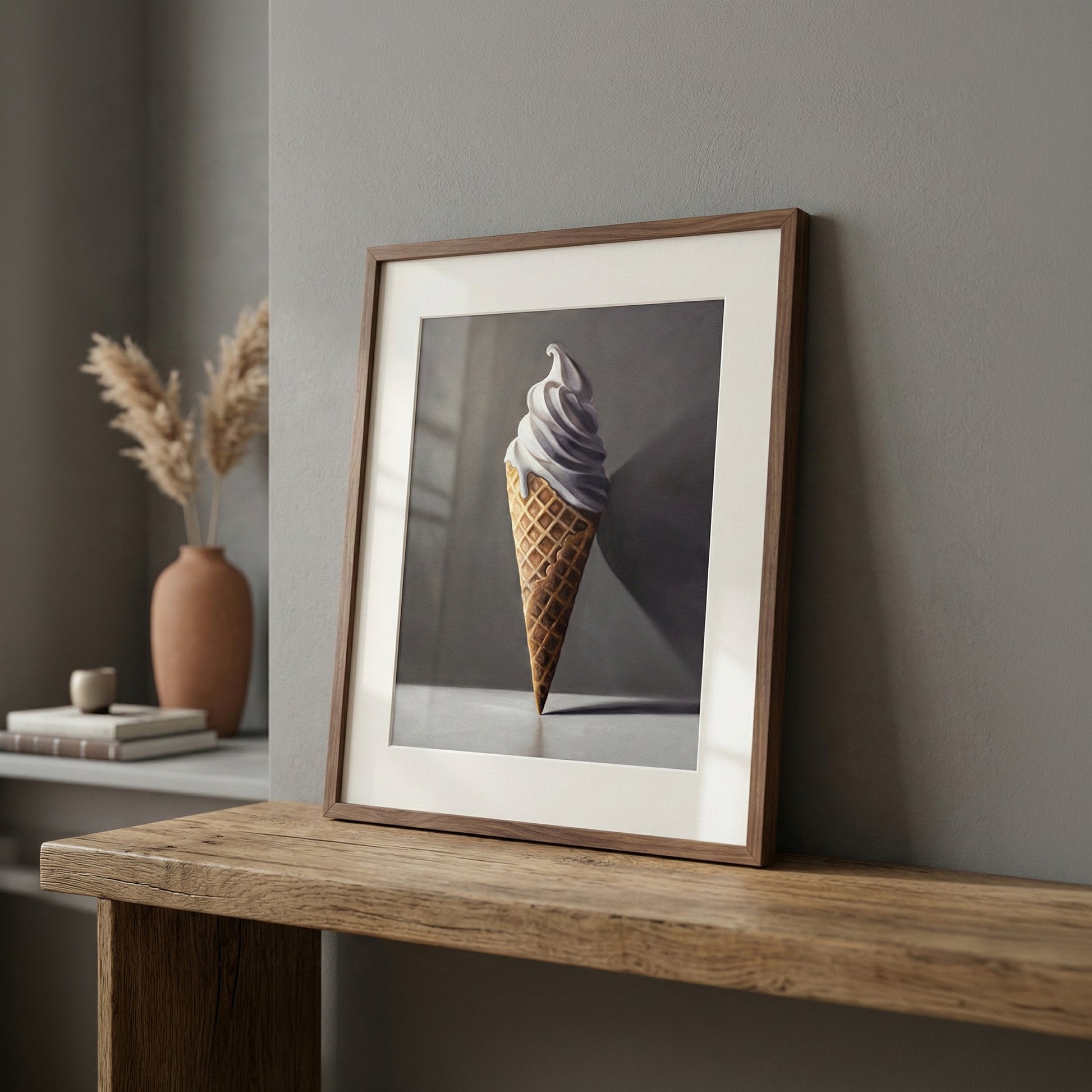 Framed fine art print of a vanilla ice cream cone, displayed on a rustic wooden surface.