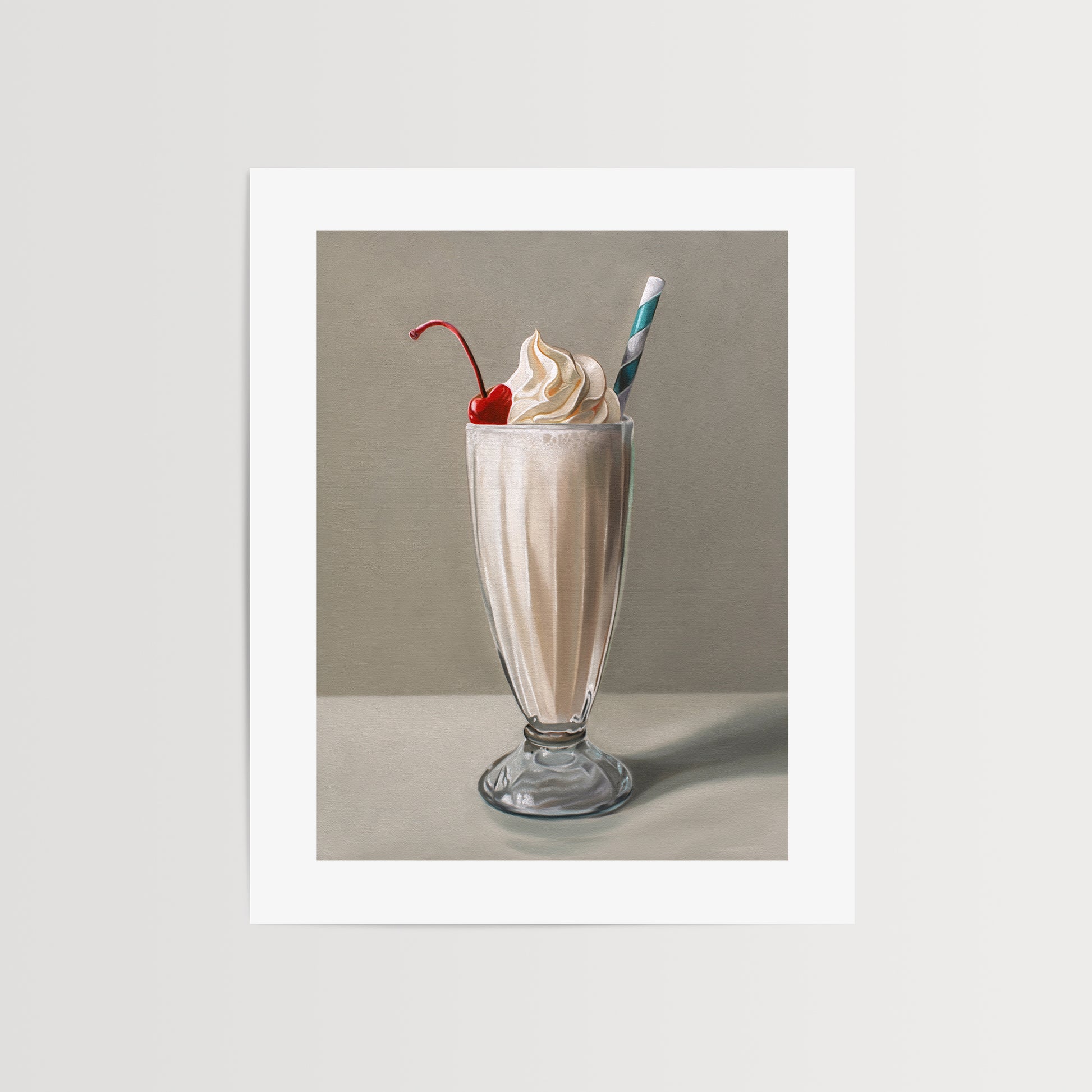 Vanilla Milkshake Fine Art Print by Lauren Pretorius: an ice-cool vanilla milkshake with a generous amount of twisted whip cream, a maraschino cherry and classic striped straw.