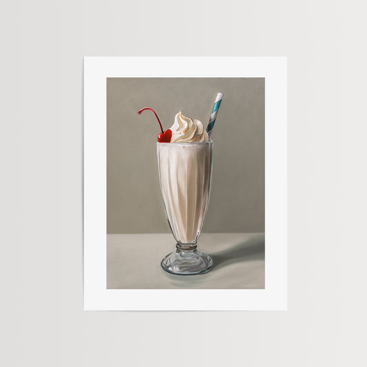 Vanilla Milkshake Fine Art Print by Lauren Pretorius: an ice-cool vanilla milkshake with a generous amount of twisted whip cream, a maraschino cherry and classic striped straw.