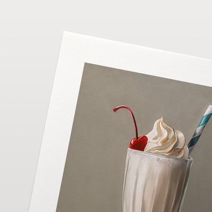 Vanilla Milkshake Fine Art Print by Lauren Pretorius: an ice-cool vanilla milkshake with a generous amount of twisted whip cream, a maraschino cherry and classic striped straw.