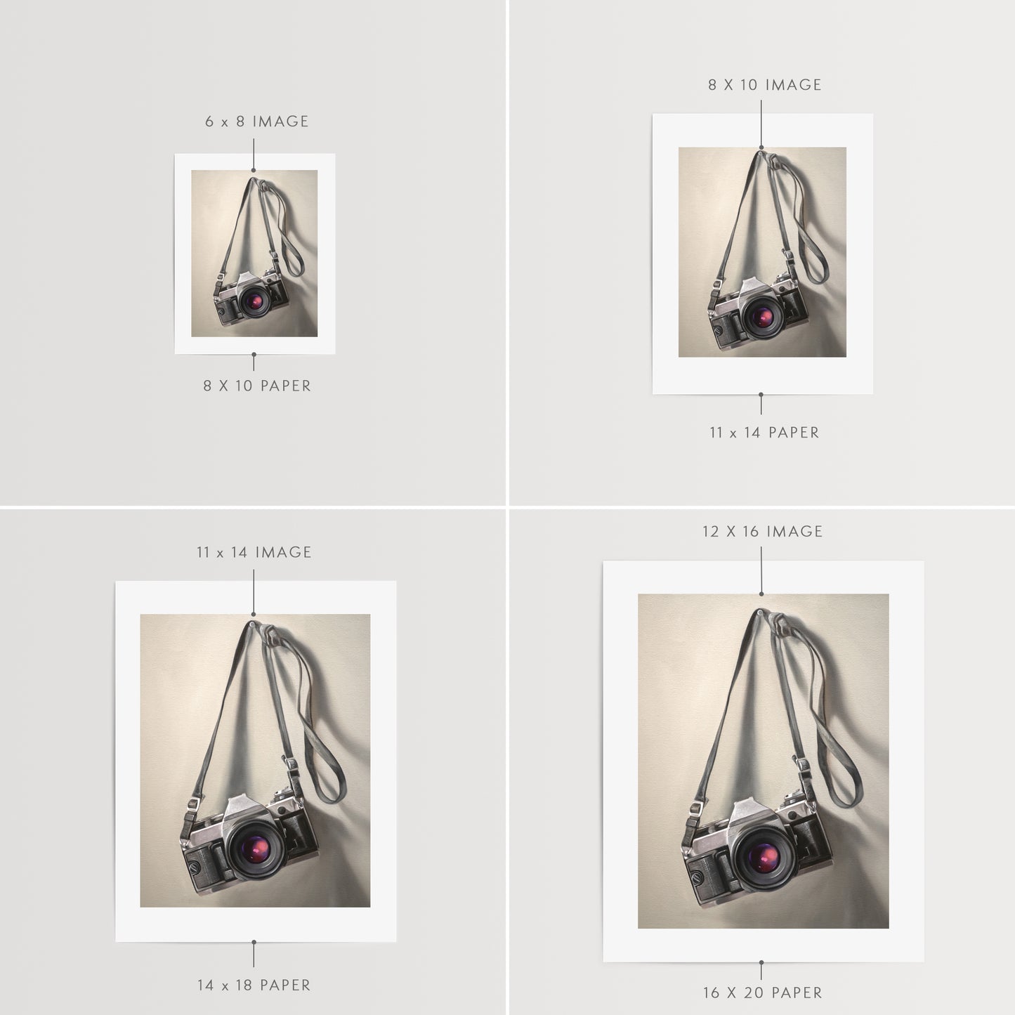 Vintage Film Camera Fine Art Print by Lauren Pretorius: a vintage 35mm camera hanging from its strap with some nice dramatic lighting.