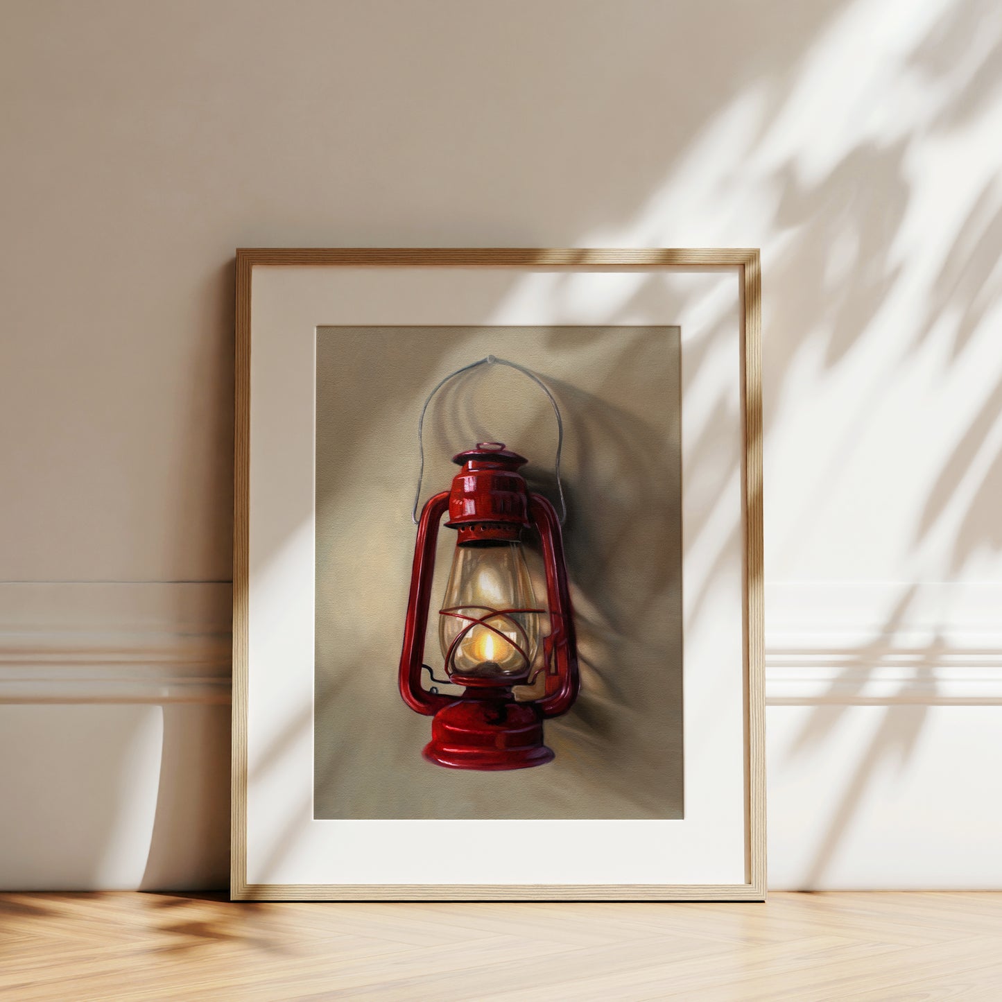 Vintage Red Lantern Fine Art Print by Lauren Pretorius: A vintage red lantern hangs from a single nail and casts a variety of interesting light and shadows upon the wall.